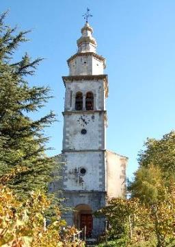 Na fotografiji je zvonik župnijske cerkve sv. Mohorja in Fortunata v Podragi